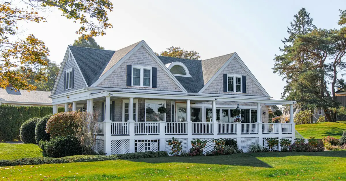 Family home with a front porch and lawn