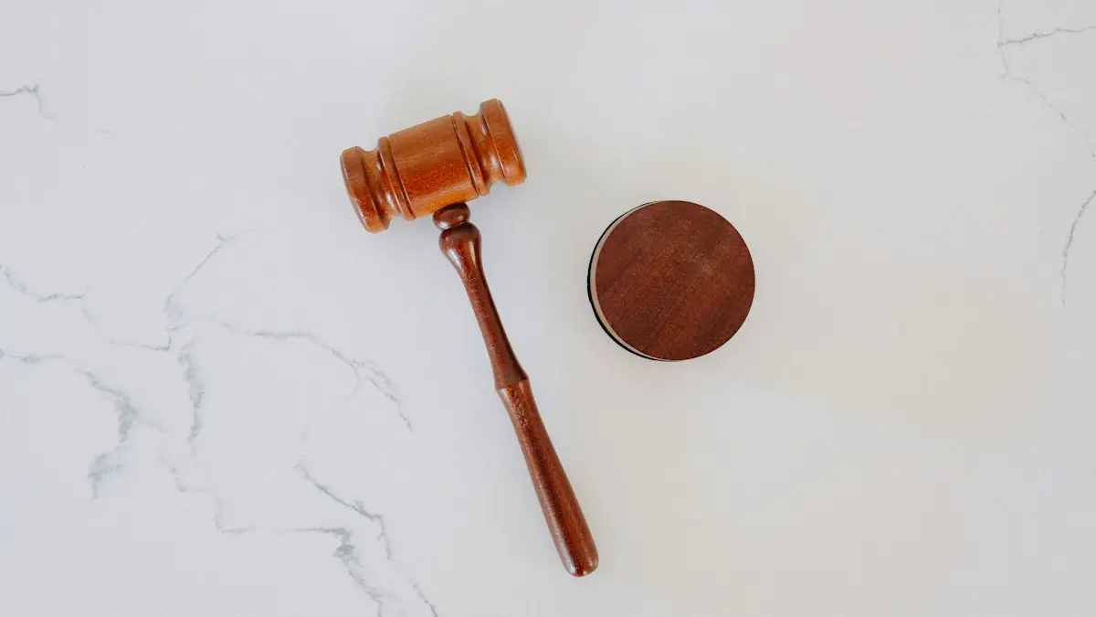 Wooden gavel and sound block on marble